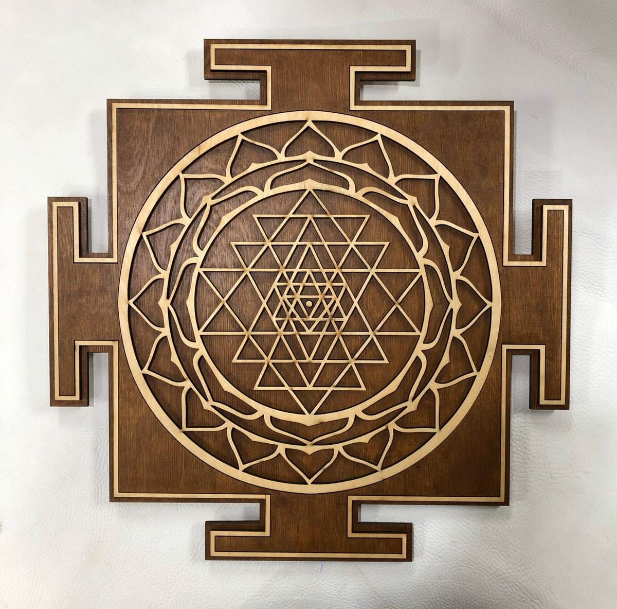 Brown and natural Sri Yantra showing the central bindu, interlocking triangles, lotus petals and outer enclosure